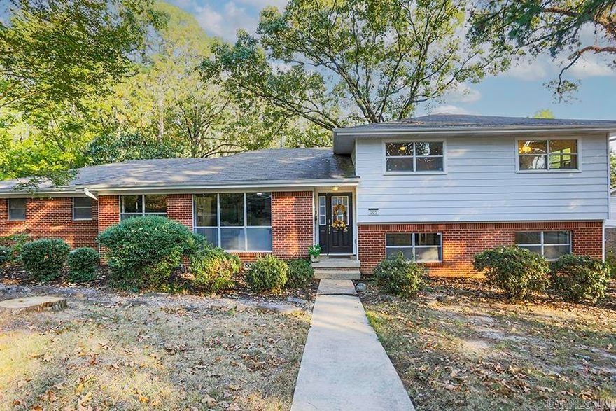 Welcome to this beautifully updated 5-bedroom, 3-bath home in the heart of Midtown! Offering a unique layout, the downstairs lives like its own private apartment - perfect for multi-generational living, guests, or potential rental income. Throughout the home you will find beautiful hardwood floors with plenty of natural light. The warm, formal living and dining room have unique and stylish finishes. The open-concept kitchen features modern finishes with stainless steel appliances and updated countertops. The family room is open to the kitchen which is ideal for both entertaining and everyday living. This spacious layout continues outside with a large backyard, providing endless possibilities for outdoor living, gardening, or play. The  two car garage with additional closet provides ample storage. In a prime location close to everything Midtown has to offer, this home combines space, style, and versatility. Agents see remarks.