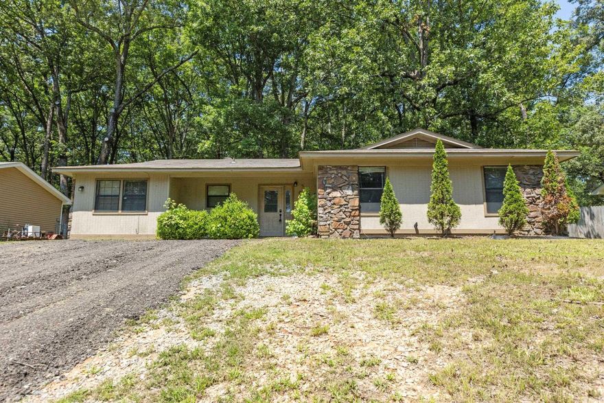 Updated!! Granite countertops in kitchen, built-in microwave, gas stove. Bonus room, ceramic tile, woodburning FP, fenced backyard, separate laundry room. Great buy with quick access to the interstate.