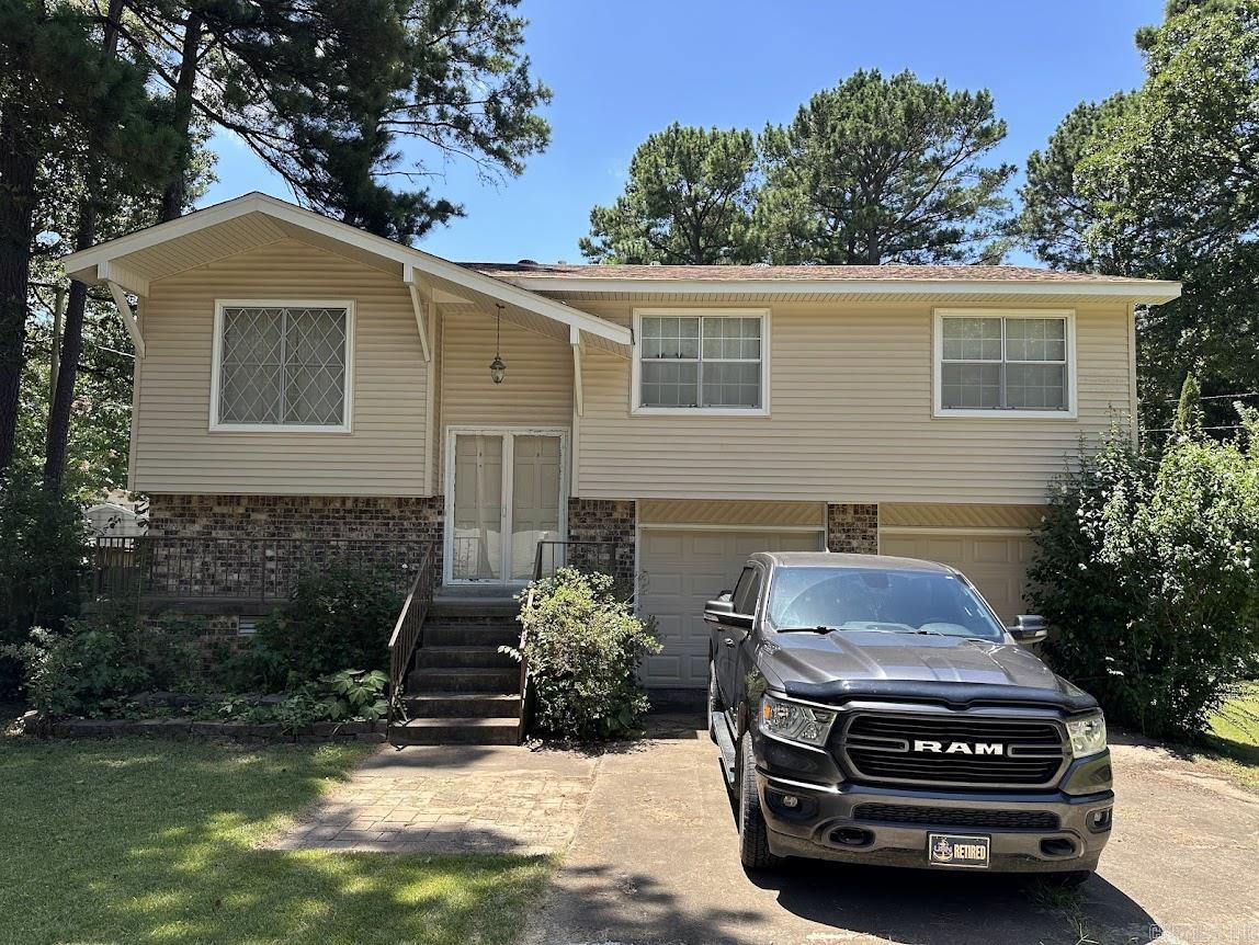 Spacious 4 bedroom, 3 bath home in a great West Little Rock location! Conveniently situated near hospitals, shopping, and dining, this property has tons of potential. Features include a screened-in back deck, cozy fireplace, attached 2-car garage, and an in-ground pool. Nestled on a quiet cul-de-sac, this home offers both privacy and convenience. It is priced to allow for a little TLC making it a fantastic opportunity for someone ready to add their personal touch. No seller property disclosure.