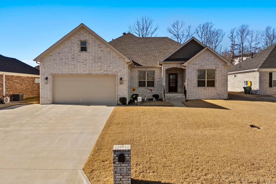 You wanted Millers Glen, here's your chance! Home is 3 bedroom, 2.5 bath, and just shy of 2500sf. No carpet here folks-Kitchen features a gas cooktop (swoon), hideaway spice rack, hidden trash bin, separate pantry, custom cabinets and huge island with useable cabinets on both sides. Living room is HUGE with a beautiful electric fireplace in the corner, mounted tv above stays too. Whole home has 10ft ceilings and can lights. Primary suite's bathroom is dreamy with a standalone soaker tub beside the custom tiled (floor to ceiling) walk- in shower with large ceiling-mounted waterfall shower head as well as a handheld. Outdoor-Don't forget the French drain system that's already in place for you! Oh, and the real stairs that take you to the attic instead of that sketchy pull down ladder... come check it out. I can't fit it all in this description so call me or your other favorite Realtor today!