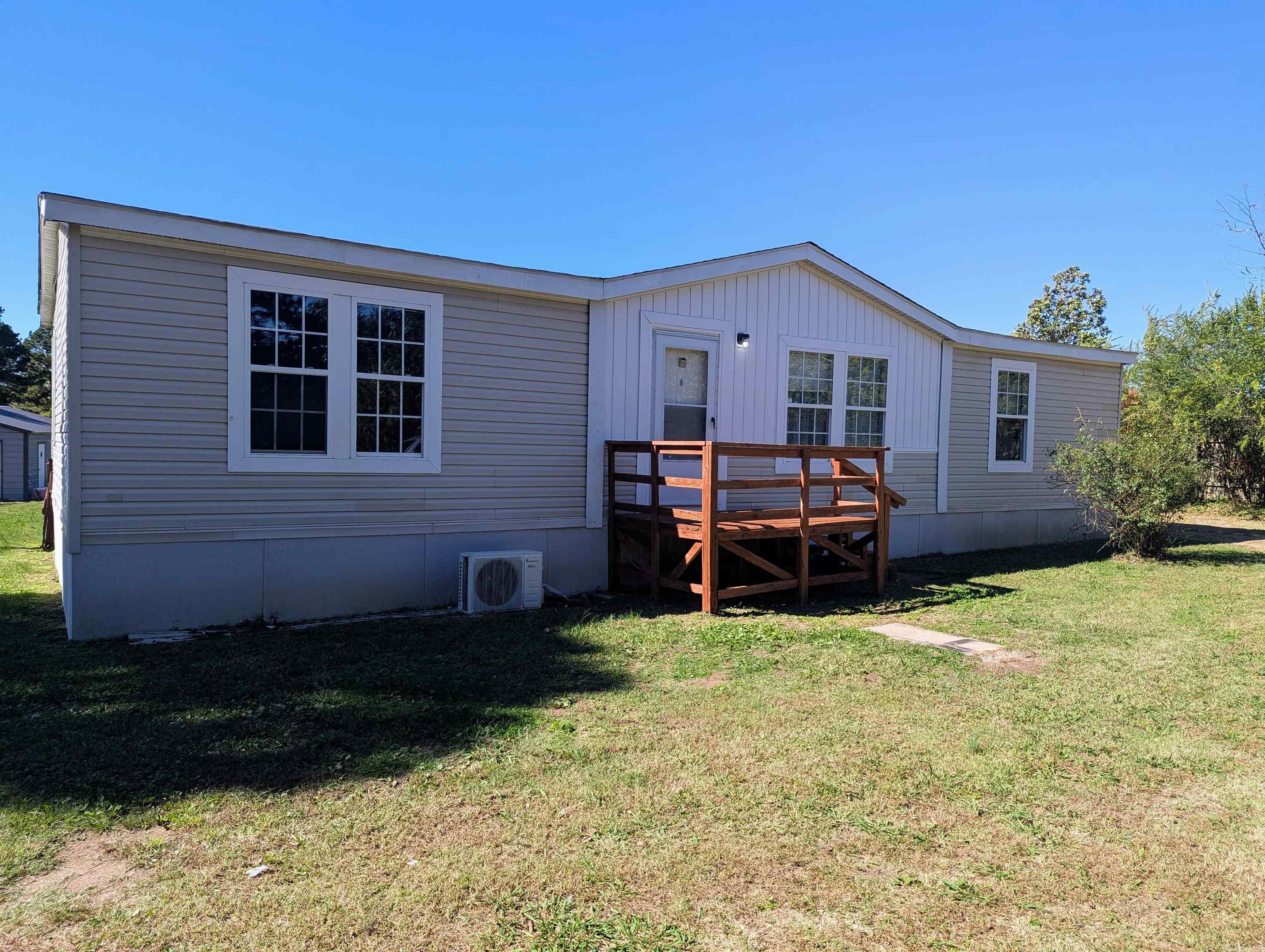 Spotless and well maintained home on 2 acres m/l. This three bedroom, two bath home features hard flooring throughout, butcher block countertops, built-ins, large primary suite, huge new shop building and lots of privacy. Lot's to love here!