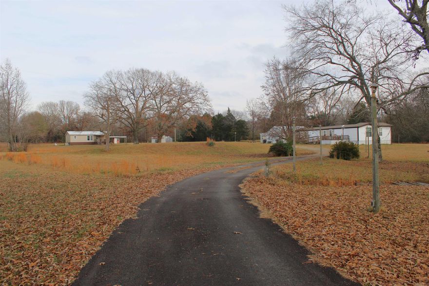 Multifamily property sitting on 6 acres. 2 homes, shop, chicken pen, greenhouse, and a small pond. Handicap accessible 4 bed/2 bath, 3 bed/2bath, full RV hookup. 30X30 shop with electric and concrete floor.  Conveniently located off of Hwy 225 E, just a 15-minute drive to Greenbrier. Don't need the 2nd home, lease it out for extra income. This property has so much to offer.