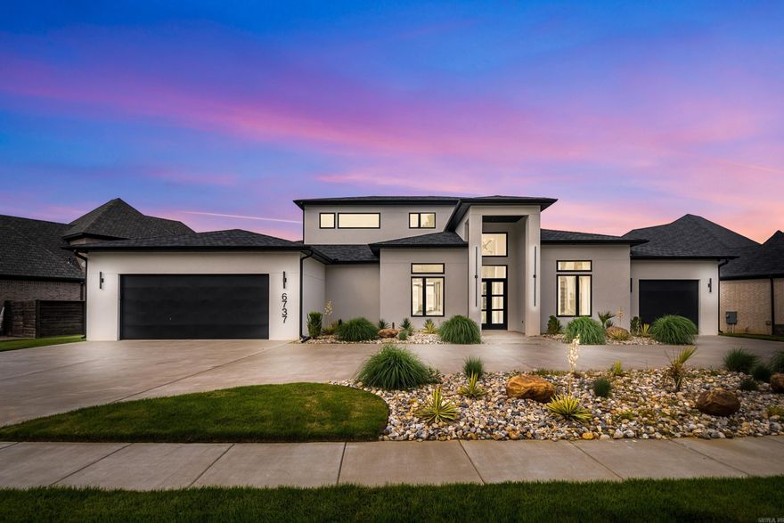 Stunning modern custom home in gated Westlake Village with breathtaking pond views and direct access to walking paths. This 4BR/3.5BA beauty features vaulted ceilings, hardwood floors, upgraded lighting, and a sleek wall-mounted fireplace with floating shelves. Chef’s kitchen includes a 6-burner gas range, waterfall island, built-in refrigerator, and large walk-in pantry. The spacious primary suite boasts a custom tile walk-in shower, floating vanities, and an oversized closet. Lives like a one-level with only a bonus room upstairs—perfect for a media room, office, or guest space. Enjoy outdoor living on the covered back porch with a stylish contemporary firepit. Includes a functional mudroom and designer finishes throughout. Located in one of the area’s most desirable gated communities, this home offers luxury, privacy, and a low-maintenance lifestyle. Don’t miss your chance to experience this exceptional property—schedule your private tour today!