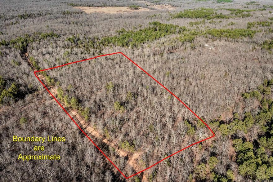 Enjoy these private 15 acres close enough to town but far enough into the country you can run livestock, have a hobby farm, and live in peace and quiet. Acreage is raw land and all wooded yet does have road access which is a 25 ft. road easement.