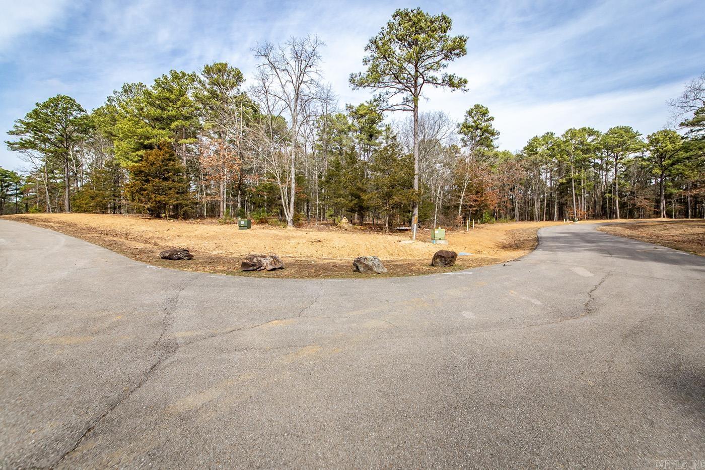 Just what the doctor ordered. Four lakeview/front tracts containing 3 m/l acres. Minimum restrictions and all utilities underground (will need to be perked), including fiber internet. Paved streets, secluded and private feel with all the pleasure's of LAKE LIFE. Don't miss out.