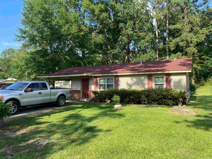 Charming 3 bed 1 bath 1062 sf home sitting on a large lot with fenced in back yard.  This home has three spacious bedrooms with ample closet size, nicely remodeled bathroom, new roof, new siding, new windows and plumbing and new septic system.  This home also has a window unit in the living room for extra cooling in addition to central heat and air, and security cameras that will convey.