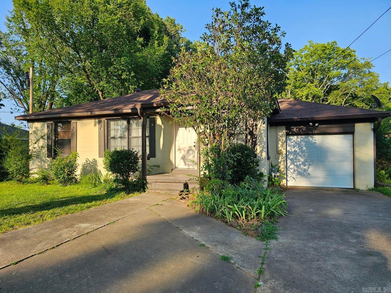 UCBL - Cute cottage style house with 2 good size bedrooms and 1 full bathroom, half bathroom and open concept. New garage door 7/23, roof and water heater is 2.5 years old. Big nice backyard to entertain or just to relax in. Main bathroom remodeled 5/23. Laundry flooring 7/23. New electrical panel in 2021 and some new receptacles.