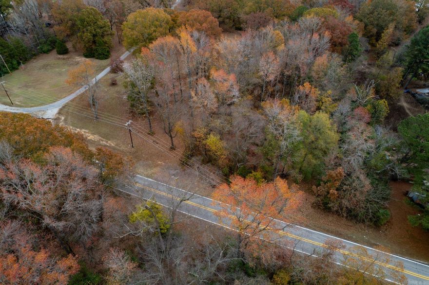 Great, mostly wooded 0.5 acre lot close to town. Property is unrestricted.  Schedule your showing today.  Agents see remarks.