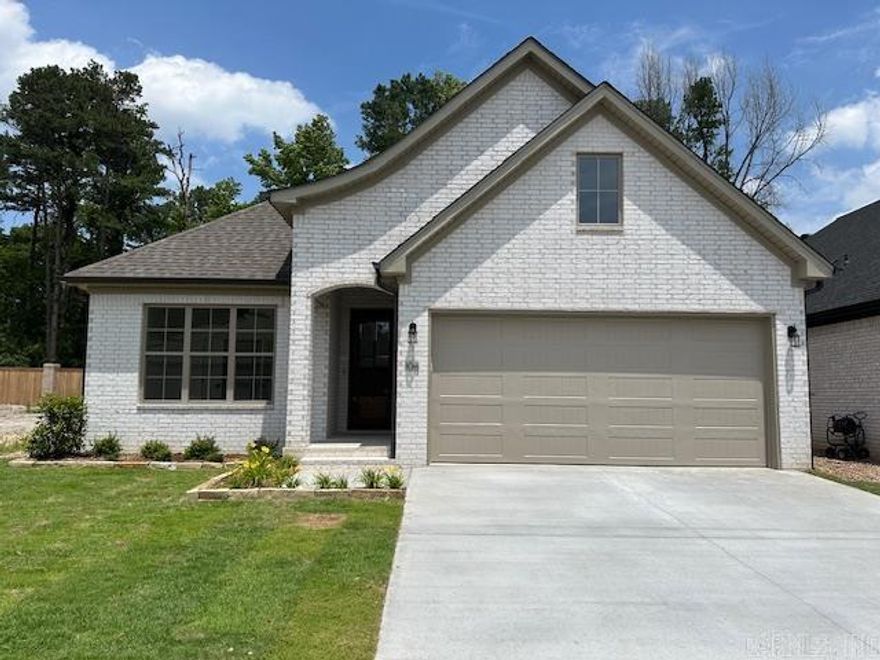Located in West Little Rock's newest destination for luxury homes! This Graham Smith Construction home is one of your last chances to purchase in Woodlands Park as the neighborhood comes to completion. This ideally located community offers lawncare (front & back lawn) included with your yearly dues and a location that puts you close to literally everything Little Rock has to offer!   108 Woodlands Park will offer a spectacular layout featuring an open-concept kitchen, living, & dining area that will be loaded with designer-curated, on-trend finishes. Enjoy the privacy of the owner's suite that is tucked away towards the back of the home with a bathroom oasis that will rival your favorite spa! A tranquil soaking tub, oversized walk-in shower with bench, and an awe-worthy custom closet are just a few of the features you will immediately fall in love with! Estimated completion of June 2024.fs