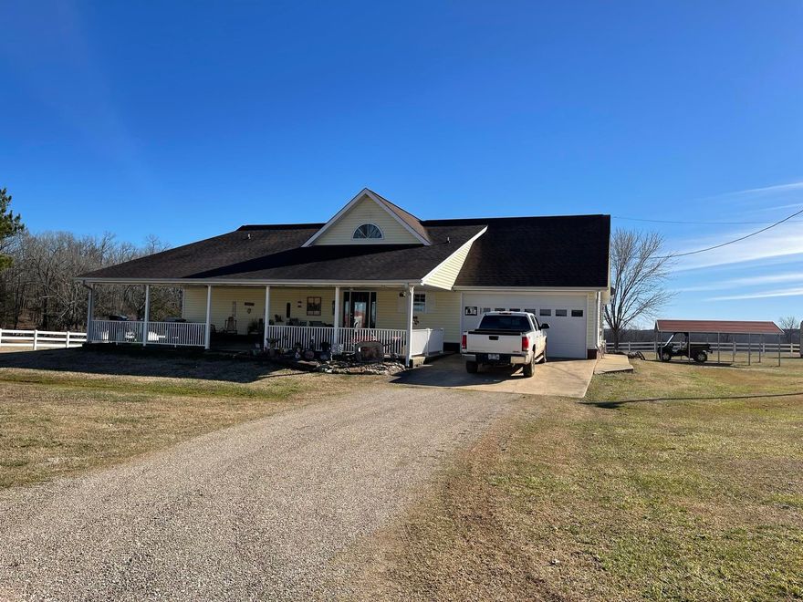 This property has everything you could dream of, and then more! The main home is around 2200 sq ft. has a large, covered porch, and a french drain all around the home. It's the perfect set up with a bedroom and 1.5 baths on the main level, 3 rooms and bathroom in the full-finished basement, which also includes a large living area, plus there is another room in the loft! The mobile home is a 3 bedroom, 2 bath.  There are several outbuildings, including a 60X30 shop with concrete floors,electric, and 3 overhead doors. Lots of fencing, 4 ponds, corrals, pasture, woods, an extra 30 amp hookup to set your rv up, fruit trees, pecan trees, dogwood tree, 2 wells plus rural water, and a working windmill!! The scenery of this place is amazing, and so peacefully quiet.  One look at this place, and you'll never want to leave.