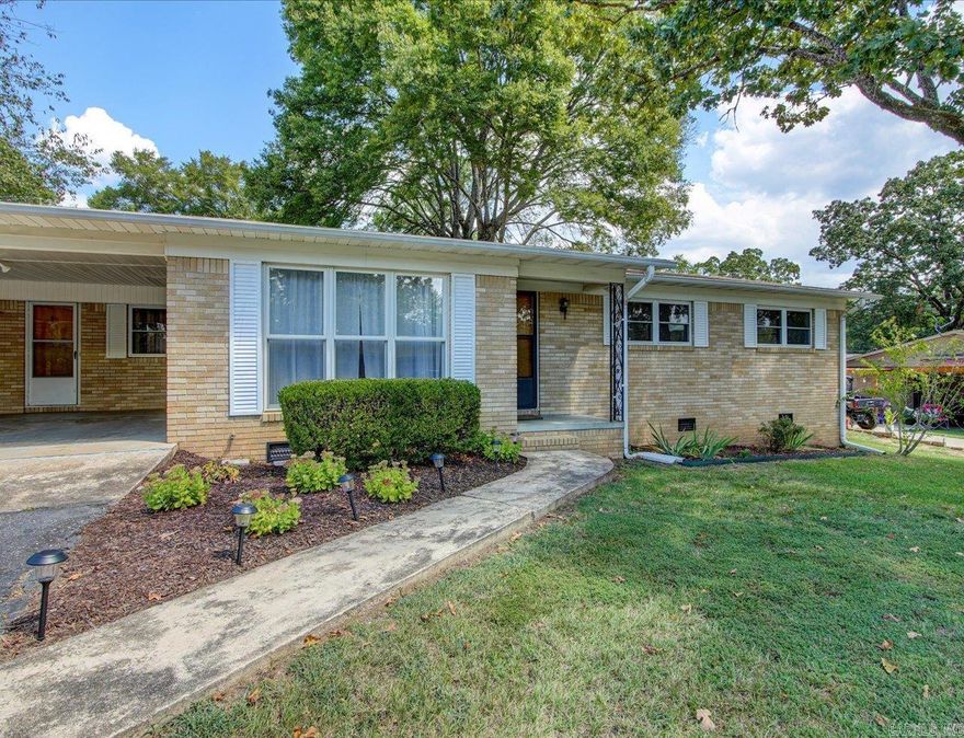 Brown Street Charmer, I love this house!  This street is boasting with pride of ownership and well-established homeowners.  Come check out this all-level brick home with screened in porch and level fenced in back yard. There is a large outside storage shed and a workshop space in the carport.  126 Brown Street has been treated well, updated, and is move in ready! The list of "News" will impress with brand new flooring, updated windows, new Roof, new light fixtures, fresh paint, new HVAC unit, new drop in gas stove, new dishwasher, and new refrigerator.