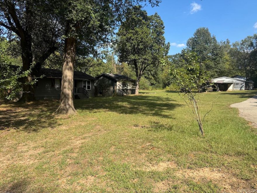 Great Investment Opportunity! This three-bedroom, one-bath home sits on a generous property and comes with two additional parcels with structures on them, offering endless possibilities for expansion, development, or extra outdoor space. The house itself needs updating, making it perfect for investors or buyers looking to put their personal touch on a property. With the right vision, this home and land could be transformed into something truly special. Conveniently located with easy access to town, this is a rare chance to own multiple parcels together.