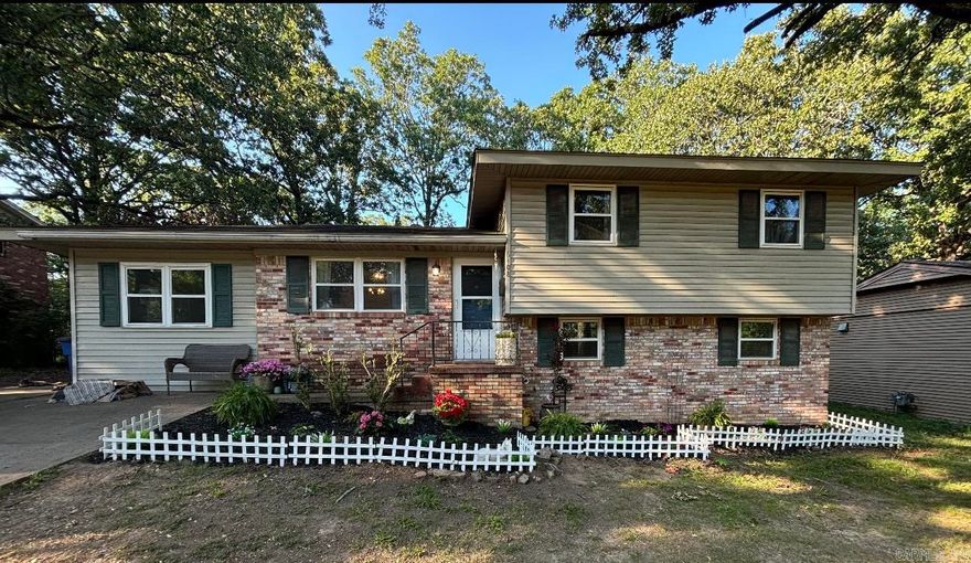 Come check out this beautiful listing in Indian Hills! This home boats new flooring, along with original hardwoods, new paint, and lighting, a cedar gun cabinet in the laundry room, and an oversized bench with hooks and cubbies in the large bonus room! Downstairs is the primary suite, including a closet that has no problem holding all your clothes! The walk-in shower has a rainfall shower head and beautiful trendy tile. All new windows 2021. All new insulation in the attic 2024. Convenient to shopping and dining on JFK and McCain, but you’ll never want to leave the house once you make this one yours!