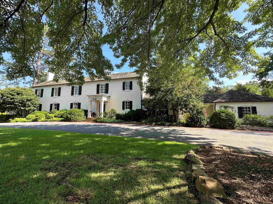 Spectacular estate nestled on half an acre, adjacent to CCLR.  Stunning!  Truly one-of-a-kind.