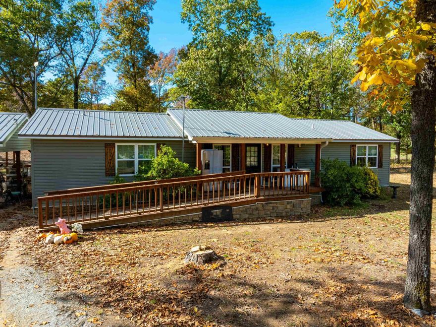 Welcome to this beautifully remodeled 3-bedroom, 2-bath home on 33± acres located on Thida Road in Bradford, Arkansas.This move-in-ready property offers country living with modern updates, just minutes from Bradford and within easy reach of Newport, Bald Knob, Searcy, and Batesville.Between 2020–2021, the home was completely renovated, including a new metal roof, vinyl siding with rock accents, windows, flooring, cabinets, central heat and air, septic tank, storm shelter, and cook stove. A handicap-accessible ramp and two-car carport add comfort and convenience.In 2025,updates continued with a new property survey, 40-ft right-of-way cleared around the boundary 60x80 dirt pad ready for a shop, 30-ft culvert installed at the driveway, and a new dishwasher.The home features an open floor plan flowing from the living room to the dining and kitchen area, with a laundry room off the kitchen.The primary bedroom is private, separate from the guest rooms.Outside, enjoy 33 acres with perimiter cleared ready for fencing,perfect for a few cows, horses, or recreation. Whether you’re a first-time buyer or looking for a peaceful forever home, this property offers country charm and modern comfort.