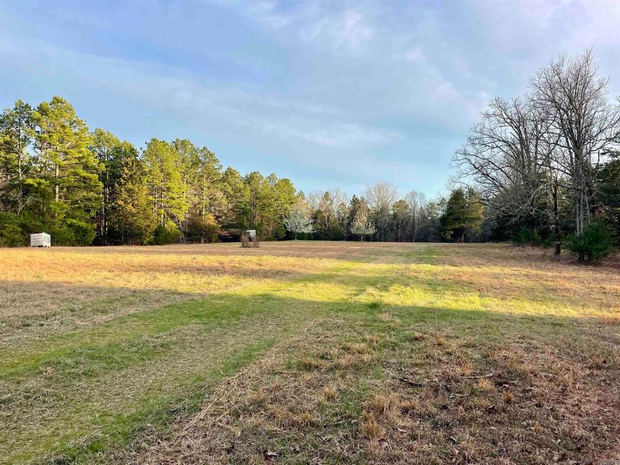 Have you been dreaming about owning your own hunting and recreational land? Experience recreational adventure on this gated, turnkey hunting property, a true gem nestled in the heart of the Ozarks. Several well-maintained food plots are located throughout the property, situated in mature pine and hardwood timber connected by a network of winding trails that provide endless possibilities for approaching stand locations or just exploring the gently rolling terrain. Take your place in one of the deer stands or box blinds that have been strategically positioned from past experiences and game movement. The cozy bunkhouse is a welcoming retreat and gathering place for family and friends after a day of outdoor recreation. The bunkhouse is not plumbed, but an excellent water well ensures you will have fresh water for drinking and bathing. There is also a great equipment shed and storage building to park your tractor and ATVs under and store gear you need to leave at the property. The managed habitat of this property is a haven for abundant populations of deer and turkey, a testament to the care and dedication poured into this special place. Gated access to this secluded property is granted