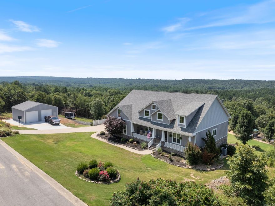 Stunning custom-built home built in 2015 with everything a  home owner could want! The main floor includes a chef's kitchen with oversized stainless steel subzero refrigerator/freezer, a gas range with a pasta faucet with open dining area and a large breakfast bar. The living room has 12 ft ceilings, a gas fireplace, and surround sound upstairs and downstairs. The house offers 6 bedrooms, 3 full baths, and 1 half bath. The lower level features 3 bedrooms or 2 bedrooms and an office/workshop, a large living area or game room, a wet bar, full bath, a safe room, and newly built 30x30 shop. Relax in the luxury saltwater pool with two tanning decks, all controllable by a phone app. Separate hot tub spa on deck conveys with home. Outdoor Speakers by pool and top deck, a firepit, and a children's playground area. Both decks have gas line hookups, perfect set up for grilling while entertaining. Easy attic access from the garage stairwell. Attic is floored with a ton of storage space. Includes two 80-gallon hot water tank. Don't miss out on your dream home!