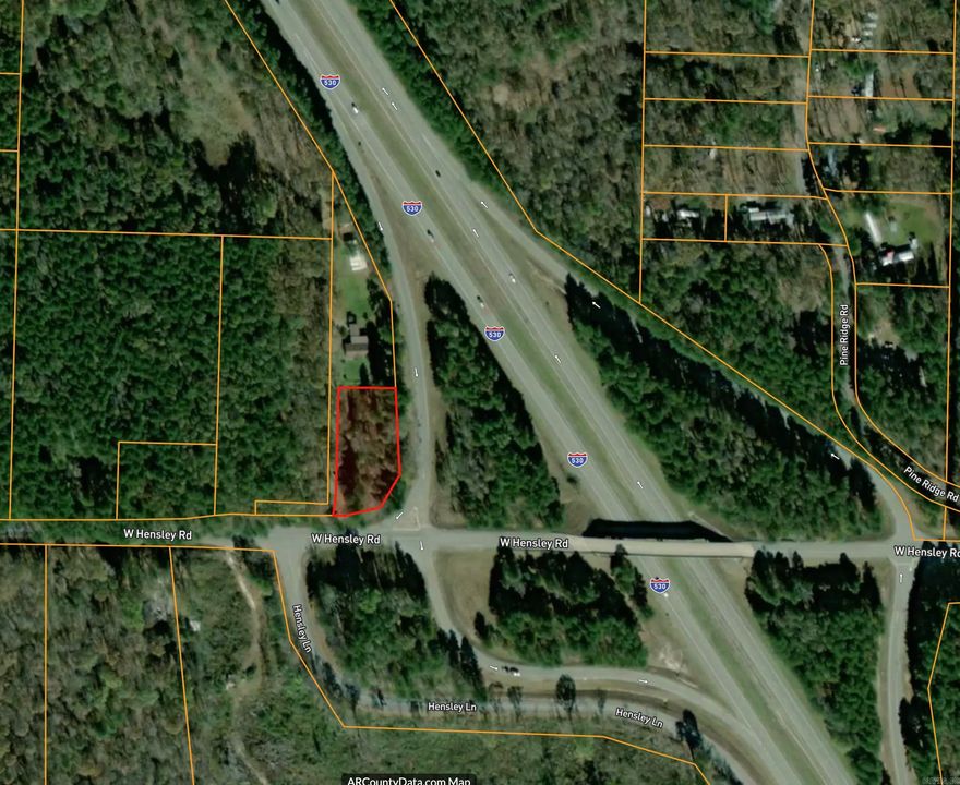 Cute piece of wooded land right near the freeway! Build your dream home today! Agents, see remarks!
