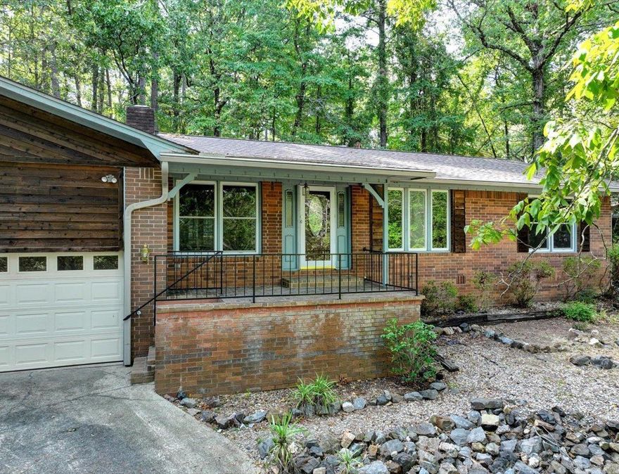 Freshly updated and move-in ready! This charming home on the west side of Hot Springs Village is just minutes from the West Gate, Walmart, shopping, and restaurants. Recent updates include a brand new roof, newer windows, fresh paint throughout, and a serviced and updated HVAC system. The kitchen boasts beautiful granite countertops, perfect for cooking and entertaining. Enjoy the great sunroom that overlooks the large lot, offering plenty of space for outdoor activities and relaxation. This home is a must-see in a prime location!