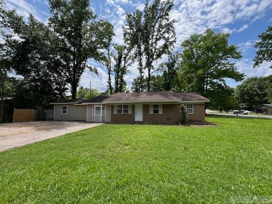 Newly renovated spacious 4 bedroom home with large fourth bedroom and huge walk in closet great  for a private home office or  a master bedroom  separate from other bedrooms.  This home features new Crown Molding which gives it a million dollar feel. Also brand new Luxury Vinyl Plank Floors add to the excellent upper end appeal of the home. Great floor plan includes easy access from living room to the large kitchen which opens into a large den with a place for a dining table and a den large enough for a large family room. Den opens into a Florida room on back. Back yard is landscaped with weatherproof rock. Open to view anytime by just calling  Showing Time. Home inspection welcomed.