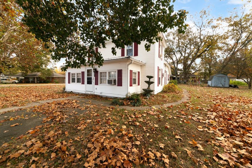 Historical Home with southern charm! This home has had lots of updates. New metal roof, kitchen updated, metal on ceiling in some areas, High ceilings, new plumbing under the house, and much more. Primary bedroom and bath down stairs, 2 Bedrooms upstairs, separate dining room, laundry room with washer & dryer that stays. Sunroom on the front of home. This home is situated on a great corner tree shaded lot with a detached 2 car garage. Very affordable and ready for a new family. Take a look today!