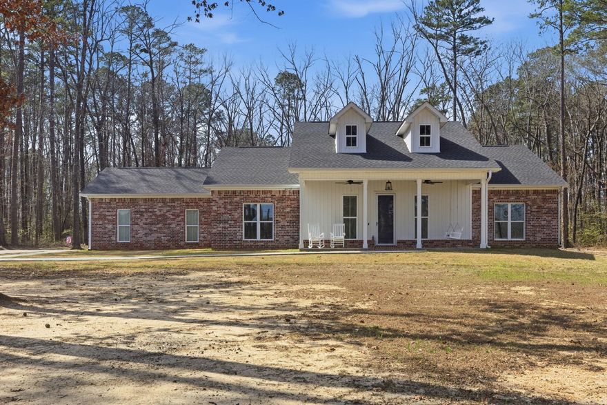 Situated on 3.5 acres just minutes from town, this 3 bed, 3 bath home also features a dedicated office. The secondary bedrooms share a convenient Jack-and-Jill bathroom. Enjoy cozy front and back porches and a welcoming feel the moment you walk in.