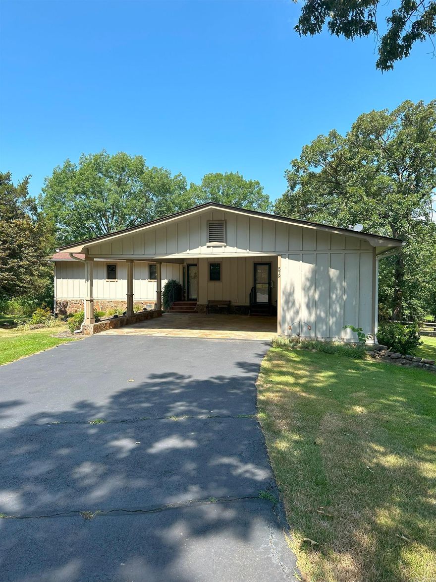 Welcome to the market this cozy and well-maintained home on the shore of Greers Ferry Lake.  Beautiful view and easy walk to the Lake! Large backyard with white line lower than the backyard.2 bedrooms upstairs and one downstairs that is currently used as a game room. Lots of updates since purchased last. Quartz counter tops in kitchen, newer vanities in bathrooms, leaf guards, Marvin windows and doors, permanent deck, tankless water heater, mini split downstairs, motion sensor lighting, new pave stone in carport & storage galore throughout home. The narrows boat launch is 5 minutes one direction and Devils Fork boat launch is 7 minutes the other direction or grab your coffee and walk down your path for a morning swim.  It truly is a slice of paradise. Don't miss out schedule to see it today. Agents see remarks.