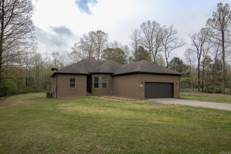 Welcome to this beautiful brick home situated on 1.60 acres in a small neighborhood of newer homes.  Check the boxes for space, privacy, and a move in ready home!  Inside there is a spacious layout with beautiful wood flooring, abundant natural light, and a neutral color palette. The kitchen offers plenty of cabinet and counter space and flows nicely into the living room.  Primary suite provides a relaxing retreat & separate from additional bedrooms. There is also a separate dining room that could be an office space for you! Outside you'll enjoy the wide-open space with room to build a hop, pool or dream outdoor garden.