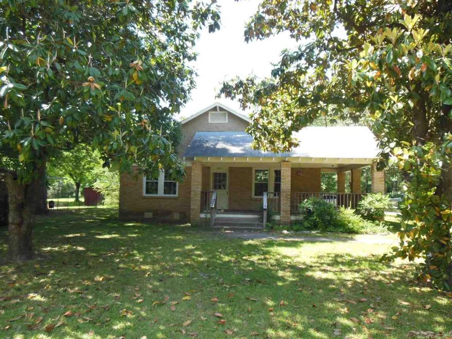 HUGE 2 bedroom, 1 bath, large furnished kitchen w/gas stove, laundry, living/dining room, breakfast room, cedar closets, great storage, large wrap around covered front porch, carport, 260 sf garage/workshop on 2+acres. CALL Richard at 501-414-8340 Marshall Peters & Associates
