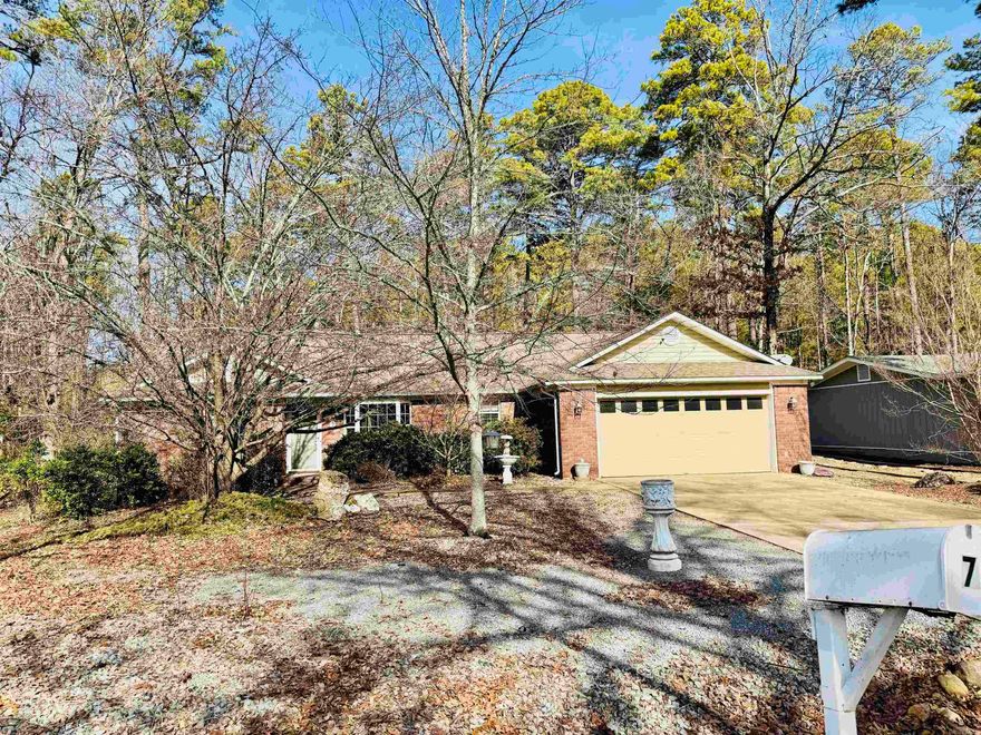Well maintained home in a Lake Desoto Neighborhood.  3 bedrooms, 2 baths, open floor plan.  Screened in back porch.  Gas log fireplace.   Sep. tub and shower in the primary bath.  Hot Springs Village offers many amenities come check them out! Agents please see remarks.