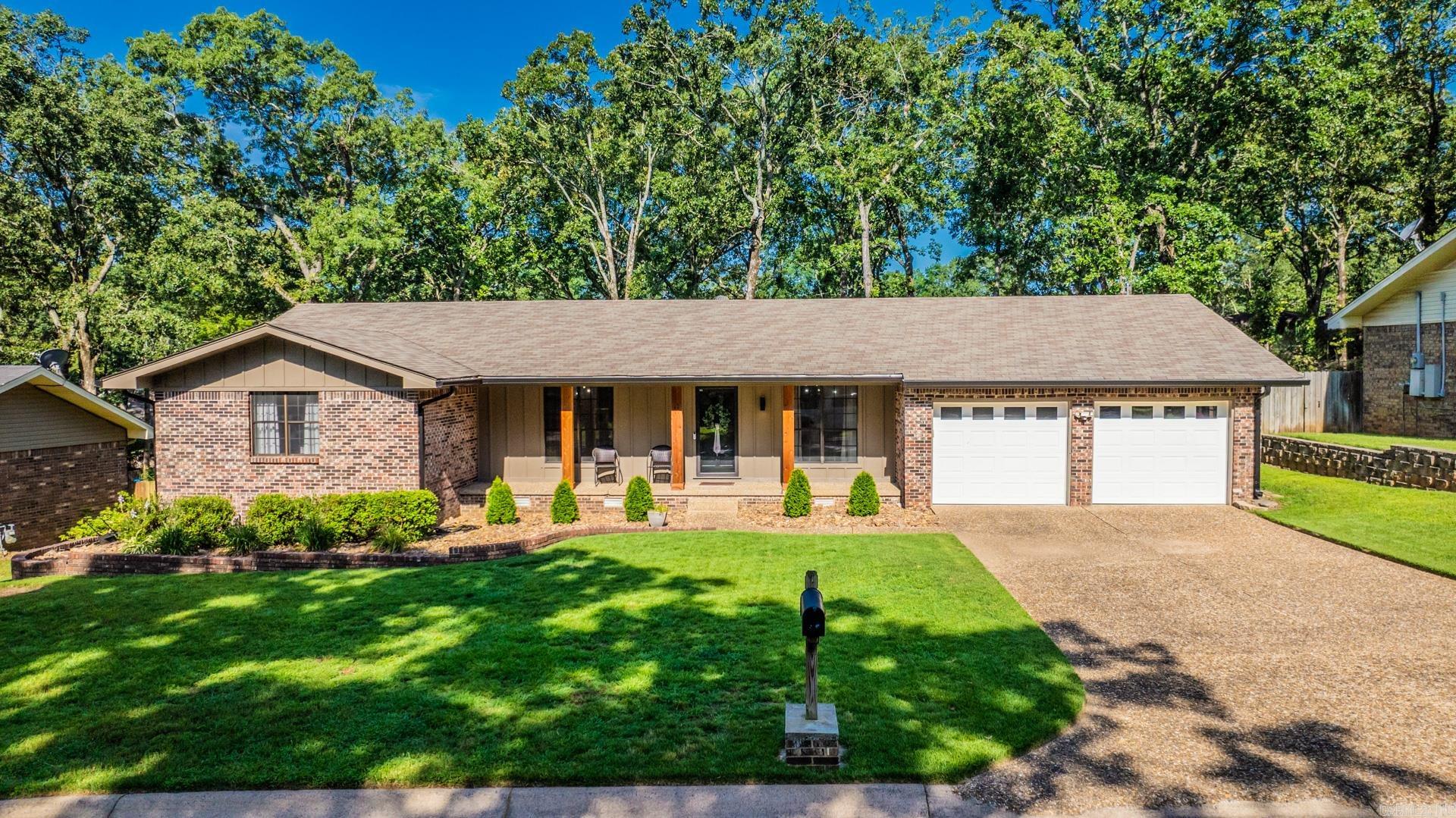 Prepare to be impressed the moment you walk in! This beautifully updated home is filled with stunning upgrades and thoughtful details. It offers 3 bedrooms, 2 baths, a spacious living room with fireplace, an office, formal dining room, eat-in kitchen, laundry room, and a bright sunroom. The kitchen shines with new granite countertops, freshly painted cabinets, stylish backsplash and hardware, plus a new dishwasher and disposal. The sunroomājust off the kitchenāfeatures walls of windows and opens onto an updated deck, perfect for relaxing or entertaining. Both bathrooms have been completely remodeled, and the home also features new flooring, paint, and lighting throughout. Even the electrical service has been upgraded. Outside, youāll find charming updates as well: beautifully trimmed porch columns, fresh exterior paint, a covered deck addition, and thoughtfully designed landscaping with lush plants and oversized river rock. HVAC replaced 2017, water heater 2020, fully fenced level yard, a two car garage and great neighborhood are a few extras this home offers. See agent remarks regarding dog.