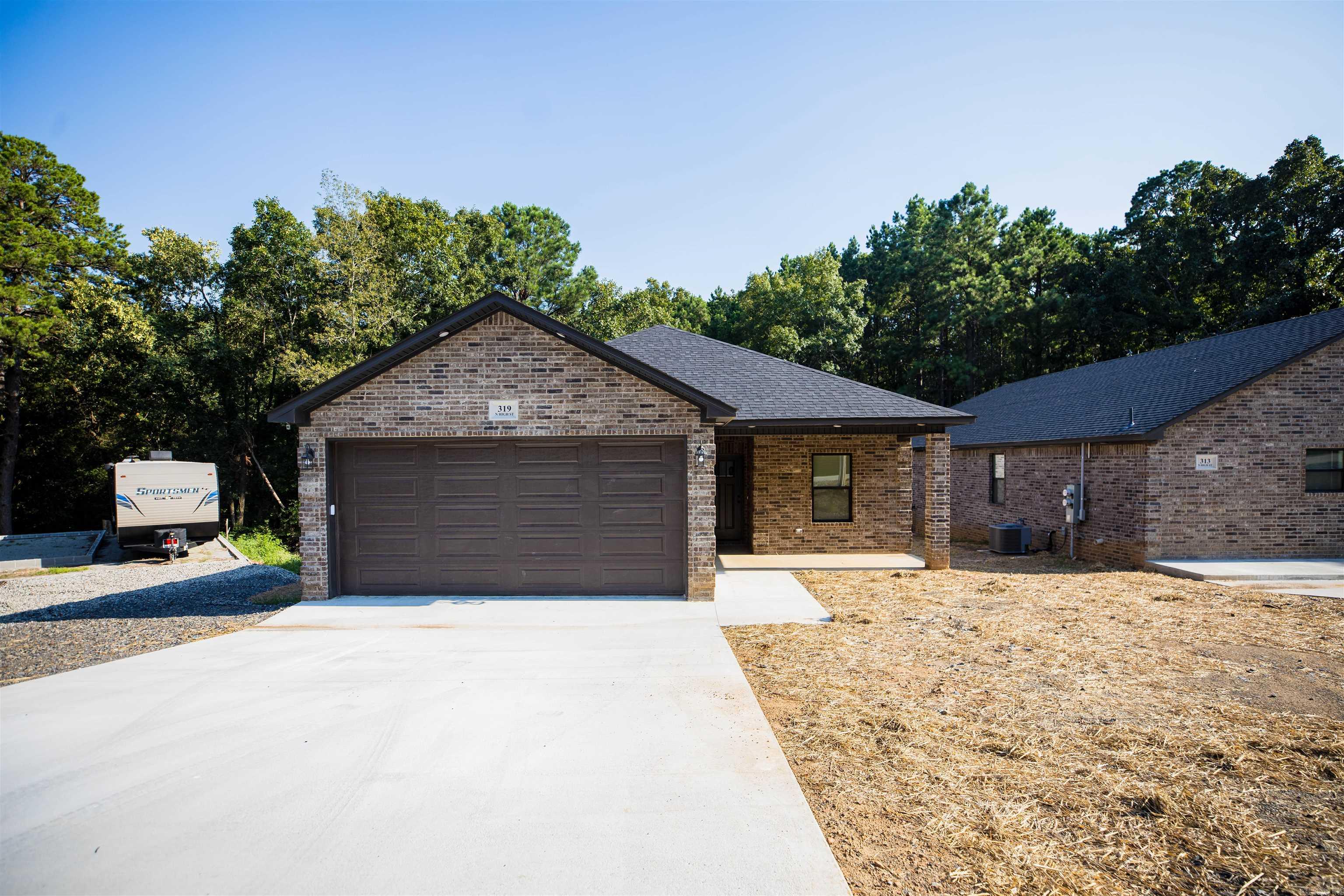 New construction in the heart of Heber Springs offers an invitation to a vibrant lifestyle with a touch of lakeside allure. This property features 4 bedrooms and 2.5 baths with 2-car large garage with ample space for 2 vehicles and storage. Extra features include spray foam insulation for energy efficiency, 2 large closets in the master bedroom and LVP flooring. If you are looking for an investment property, this property stays rented approx 28 days a month with great rental income. If you are looking for a lakehouse, it's less than 1.5 miles to Greers Ferry lake. Comes Fully furnished!!