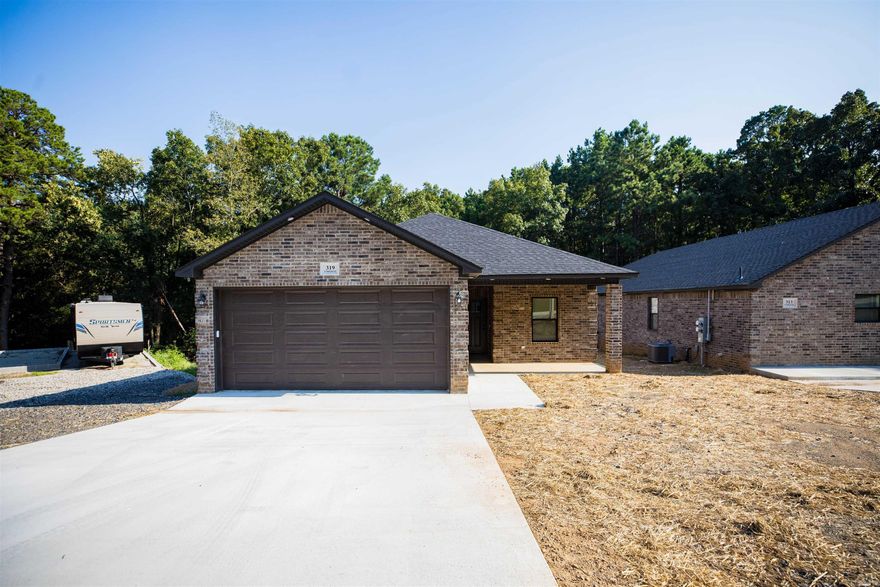 New construction in the heart of Heber Springs offers an invitation to a vibrant lifestyle with a touch of lakeside allure.  This property features 4 bedrooms and 2.5 baths with 2-car large garage with ample space for 2 vehicles and storage.  Extra features include spray foam insulation for energy efficiency, 2 large closets in the master bedroom and LVP flooring.  If you are looking for an investment property, this property stays rented approx 28 days a month with great rental income.  If you are looking for a lakehouse, it's less than 1.5 miles to Greers Ferry lake.  Comes Fully furnished!!