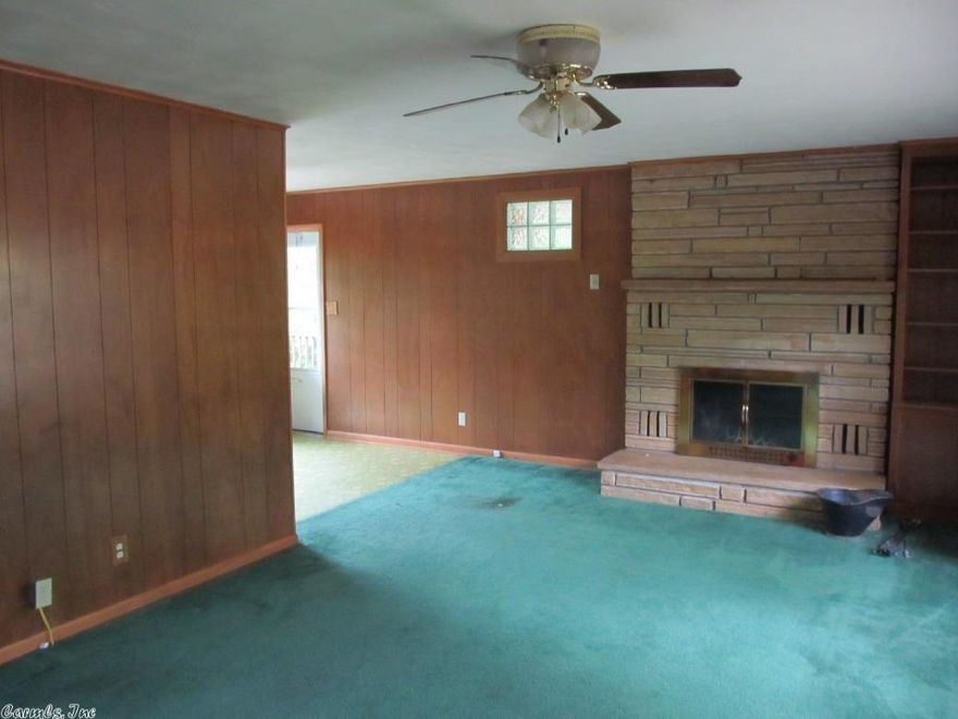 New Listing! Looking for a bargain? This could be the one for you. Offers 2 bedrooms, 1-1/2 baths, approximately 1008 sq. ft. upstairs and 1008 sq. ft. unfinished basement. Lots of room to grow. Central heat and air plus a fireplace and carport. Great retirement home, weekend get away place or rental. Very private location. Great deck on the back to watch the local wildlife and enjoy the outdoors!! Priced to sell at $39,900.