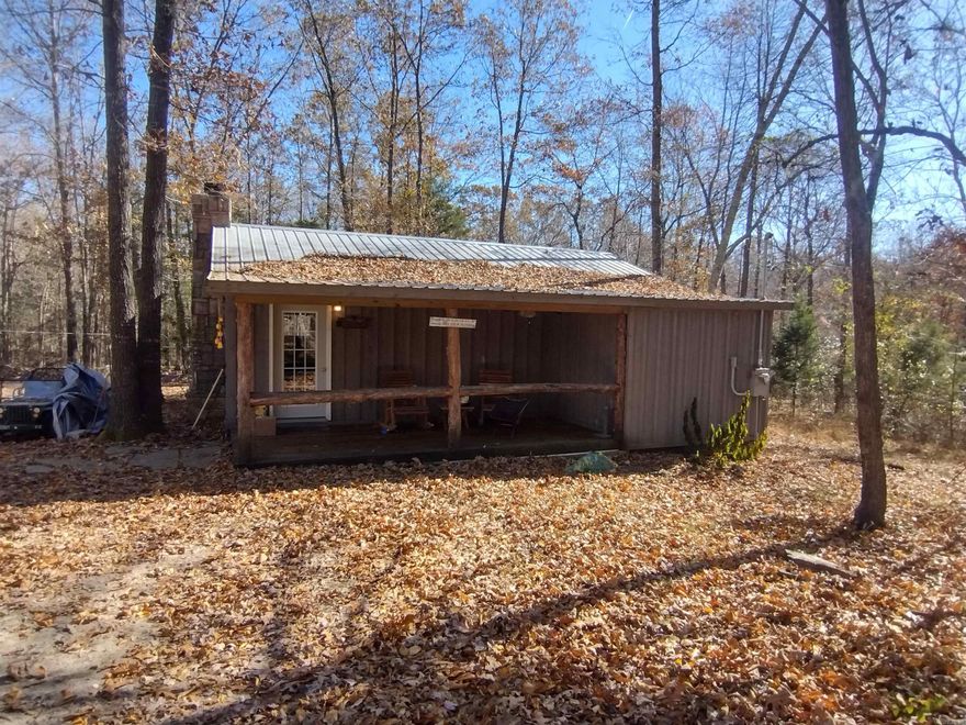 Check out this one bedroom one bath cabin joins Ozark National Forest make a great getaway place or would be great little home.