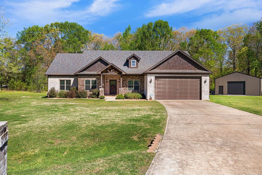 Step inside this gorgeous custom-built 4 bedroom, 2 1/2 bath home located in one of the most desirable family-friendly neighborhoods. The home features an open floor plan with an abundance of natural light, a beautiful wood vaulted ceiling, and a cozy fireplace accented with built-in lighted bookshelves on each side.  The spacious kitchen is a chef's dream with an oversized island, ton of cabinetry, pot filler, wine fridge, under cabinet lighting, pantry and stainless-steel appliances. The split primary bedroom offers a huge en-suite with a soaker tub, his and her walk-in closets, double sink vanity and walk-in shower. Get ready to enjoy summer evenings on your covered back porch while entertaining friends and family on 1.47 beautiful, serene acres! There's additional storage or plenty of room to start a hobby in the 30x40 insulated shop that features a 12 ft bay.  Located in a quiet cul-de-sac, the Cabot School District and easy access to shopping, restaurants and l-57, this home won't last long!  Schedule your private showing today! Agents see remarks!!