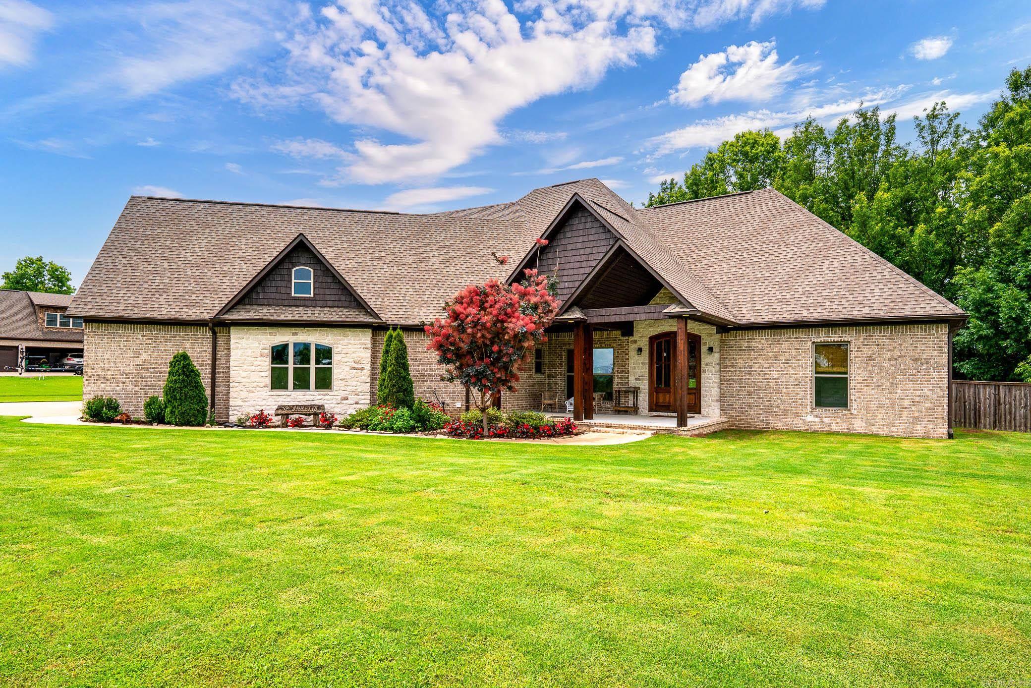 ONE OWNER HOME THAT LOOKS NEW! BEAUTIFUL OPEN AND AIRY FLOOR PLAN WITH A LAKEFRONT VIEW FROM YOUR GREATROOM AND KITCHEN! RELAX ON THE DECK OR THE COVERED PORCH. BUILT IN BOOKCASES ON EACH SIDE OF THE FIREPLACE AND CABINETS BELOW. PRIMARY BEDROOM AND BATH ARE OFF THE MAIN LIVING AREA. OVER SIZED BEDROOM WITH AN ATTACHED BATH WHICH FEATURES A SOAKING TUB, LAGRE WALK IN SHOWER AND A CLOSET OF YOUR DREAMS WITH BUILT-INS. TWO GUEST ROOMS WITH LARGE CLOSETS. THE UTILITY/LAUNDRY ROOM HAS AN ABUNDANCE OF STORAGE ALONG WITH A SOAK SINK. THE UPSTAIRS BONUS ROOM HAS ITS OWN MINI SPLIT SYSTEM. THE KITCHEN HAS AN OVERSIZED ISLAND THAT SEATS 8. 5 BURNER GAS COOK TOP, PANTRY WITH PULLOUTS. LARGE DINING/BREAKFAST AREA. STUNNING TRIMWORK ABOVE DOORS AND WINDOWS. PLAYSET CONVEYS, RAISED GARDEN BEDS ARE IN FULL BLOOM. THE EXTERIOR OF THE HOME IS PRISTINE AND WHO DOESN'T WANT A LAKE FRONT HOME? DON'T MISS OUT ON THIS TREASURE. NO SHOWINGS UNTIL JUNE 14, 2025.
