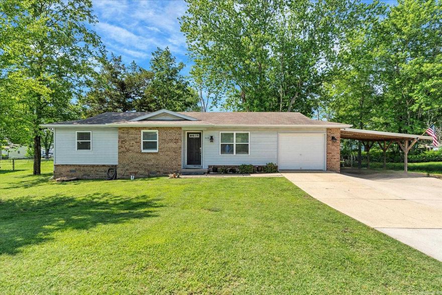 Welcome to 513 Nevada Avenue in the sought-after Northern Hills subdivision—just minutes from the hospital and close to all the in-town amenities. This 3 bedroom, 2 bathroom home has been tastefully updated with luxury vinyl plank flooring and a newly remodeled primary suite featuring a sleek bathroom and a huge walk-in closet you’ll actually be excited to organize. The open living area connects seamlessly to the kitchen, making it easy to entertain or just enjoy the flow of daily life. Out back, the spacious shaded yard is perfect for relaxing or letting the kids and pets roam, and two storage buildings give you plenty of room for extras. A two-car carport keeps things covered and convenient. Stylish, functional, and move-in ready—this one checks all the boxes.