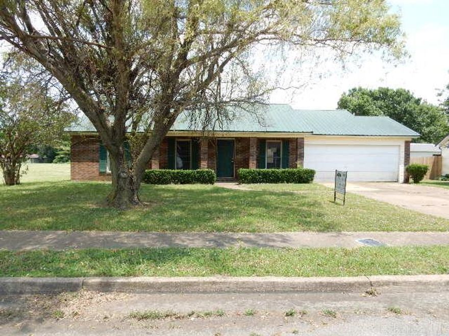 Just Listed!!    This home comes with 3 berdrooms-1 being the primary as it has the attached bath, but also a layout that could be space for your own library or workout area. 2 Baths, the living room is spacious and the kitchen/dining area is compact in size. Attached car storage is included in this home package.    This home sells as is.  Buyers Must Be Pre-Approved Or Have Proof Of Funds.