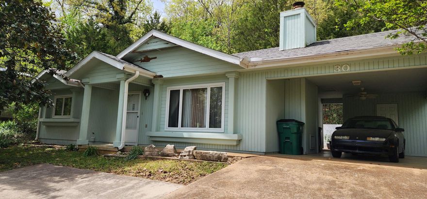 Welcome to this charming single level 2 bed 1.5 bath, perfectly situated across the street from Lake Thunderbird! Enjoy easy lake living with beautiful views year round without lakeshore or dock maintenance!  This home is currently an income producing property!!!