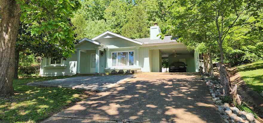 Welcome to this charming single level 2 bed 1.5 bath, perfectly situated across the street from Lake Thunderbird! Enjoy easy lake living with beautiful views year round without lakeshore or dock maintenance!  This home is currently an income producing property!!!