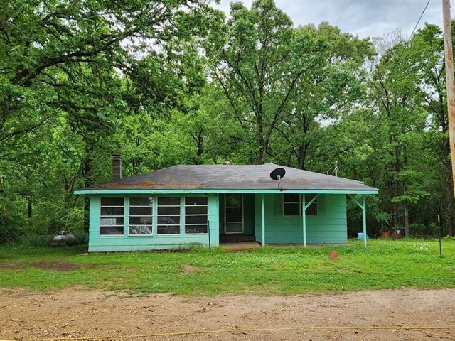 House on 1.16 acres Property being sold As Is, Where Is