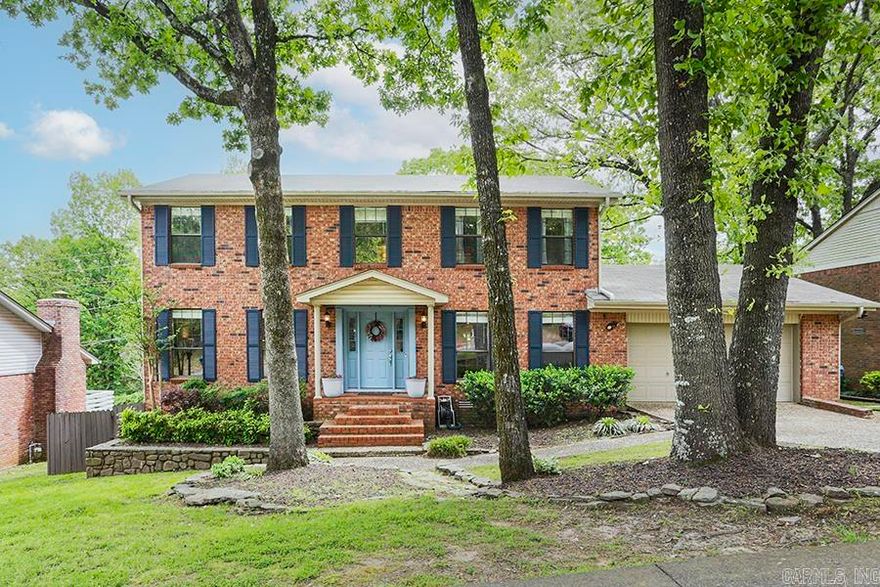 Don't miss this beautiful stately 2 story home located in a wonderful WLR neighborhood. This spacious home features 3 BR & 2 1/2 with a formal living room, dining room, and family room with a wood burning fireplace.  The kitchen offers an eat-in area, kitchen island, breakfast bar, built-ins and newly installed backsplash.  The oversized laundry room has a sink and extra storage. The 2 car garage has ample shelving and storage. Upstairs, there is an office off the Master Suite, a walk-in shower & large walk-in closet. Outside, this home offers the perfect covered deck overlooking a large backyard.  Looking out windows in kitchen and family room make you feel that you are in a tree house! An extra storage room on back of house can be a multi-use area. The perfect home for you! Come see it! See Agent Remarks.