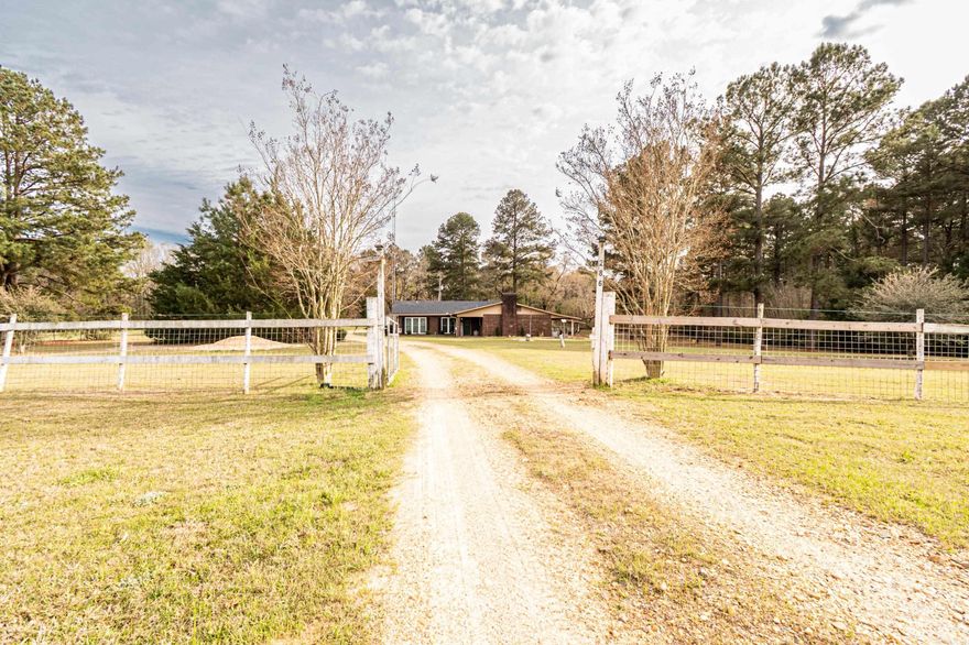 Are you looking for space and peace? Place to roam and spread out. Whether it's by the pool, out in the shop, or the patio area under the carport to watch tv and relax?Take a look at 286 Woodland Drive. This 5 bedroom, 2 bathroom, 4.99 acre home might be your next home!