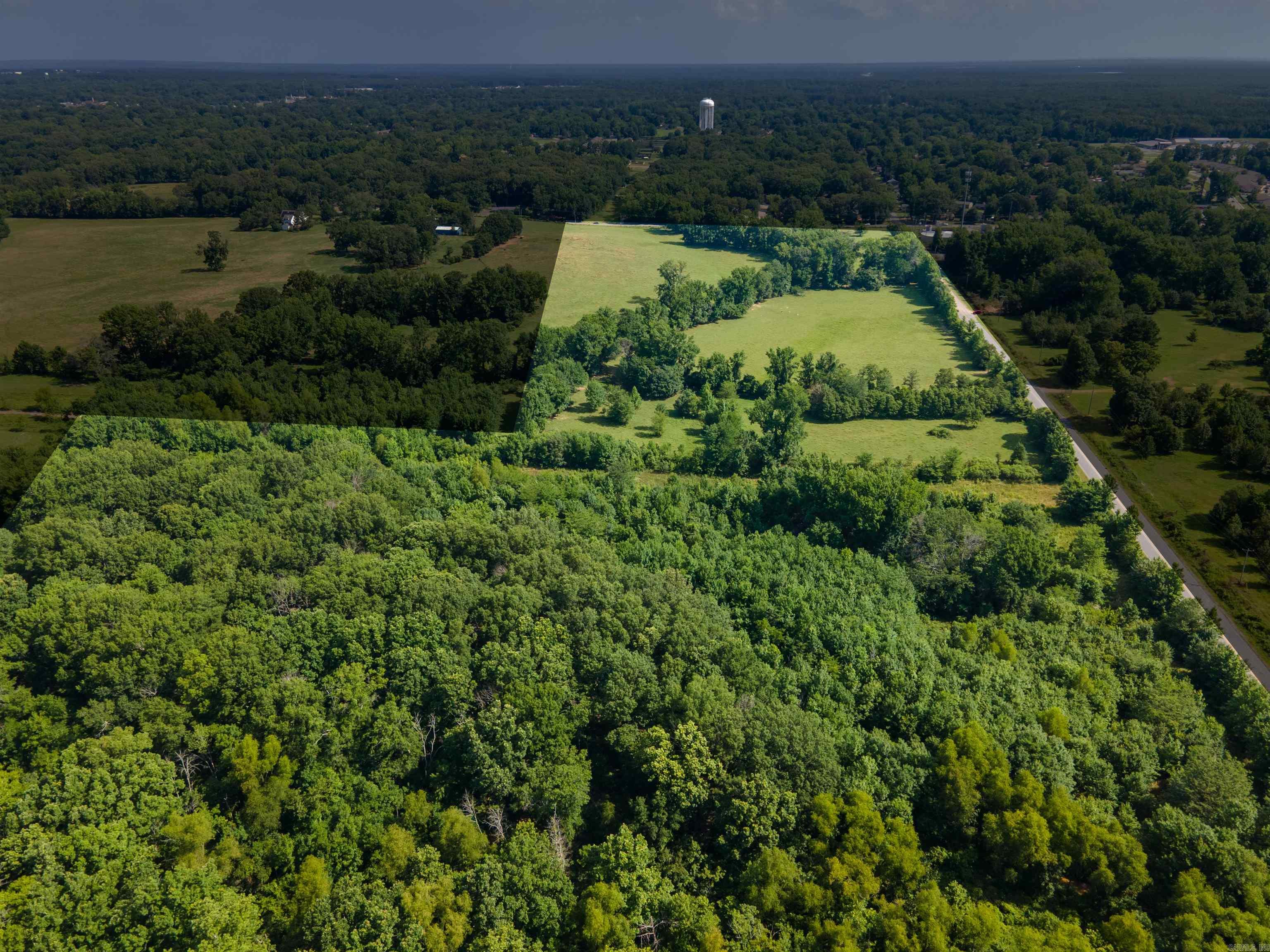 Spacious 44 Acre Property Awaits Your Vision! Escape the hustle and bustle and discover endless possibilities on this expansive 44-acre property in Jacksonville, Arkansas! Situated outside the city limits on the corner of Military Road and Southeastern, this property boasts a perfect blend of usable space and natural beauty. Unleash your dreams on a substantial 44 acres, perfect for anything from a sprawling estate to a productive mini-farm. Floodplain Considerations: Build with confidence! The property offers 19 acres above the floodplain, providing a secure foundation for your future. Immerse yourself in the tranquility of 22 acres of beautiful pasture land, ideal for grazing animals, creating a peaceful haven, or cultivating crops. Dream Home Ready: Picture your perfect estate nestled amidst the rolling hills. This property provides the ideal canvas for crafting your dream home. Open to Possibilities: Whether you envision a private residence, a horse ranch, or an agricultural venture, this versatile property offers the space and potential to bring your vision to life. Contact us today to schedule a showing and explore the endless possibilities of this remarkable property!