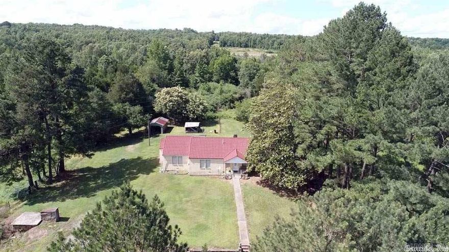 Your dream home on approximately 65 acres with a pond full of fish! Mostly wooded and fenced acreage. Pond is approximately 2 acres and at the front of the property. Hunt the land for deer and turkey with this beautiful land that is close to Conway and Heber Springs. Lots of possibilities-cabin, dream home, rental, or airbnb! Home is currently utilized as a rental property. Front part of property is along Old Springfield Road and back of property is against Enders Road. Tornado shelter by house. new roof on house - approximately 2018. New Water heater - 8/2022. New central furnace - 01/2024. Agents see remarks