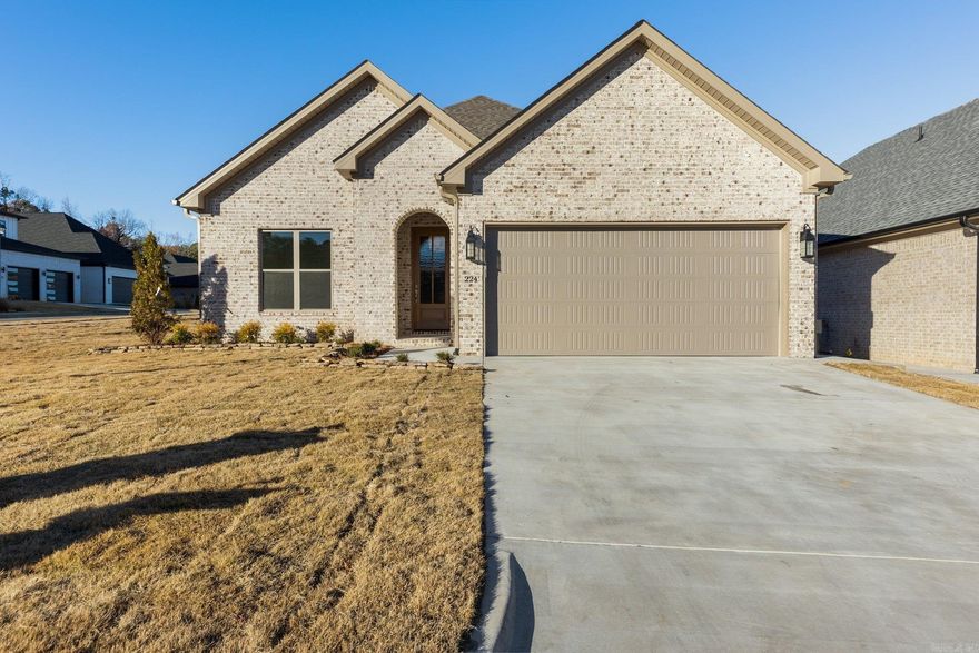 Corner lot charmer in Copper Run that qualifies for 100% financing with ZERO down! This meticulously designed home is ready for you! Enjoy unparalleled designer finishes throughout this stunner. Enjoy an open concept floor plan that is perfect for entertaining as well as everyday life. This home has an abundance of features that are sure to impress including custom cabinetry, quartz countertops, and other on-trend designer finishes in your chef's kitchen. The living area flows perfectly onto your covered back porch where you can enjoy the serenity of one of West Little Rock's most sought-after neighborhoods! Make sure you take a peek at the luxurious owner's suite which is equipped with dual vanities, an expansive soaking tub, a walk-in shower AND a custom closet that dreams are made of! Too many extras to list! This is a gem of a home!