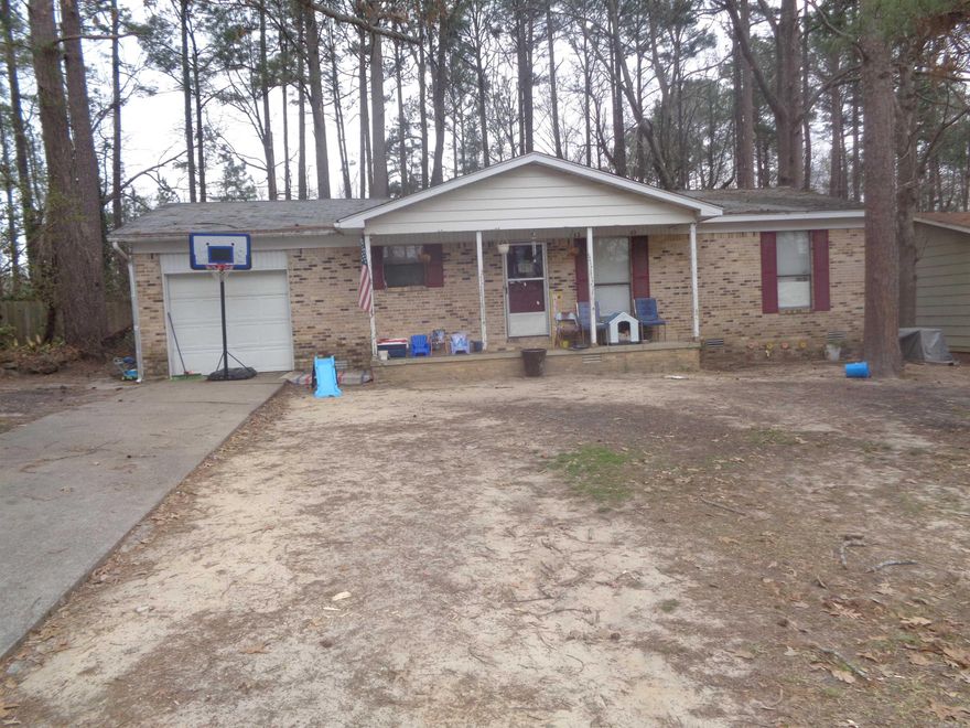 3 bedroom with 1 & 1/2 baths investment property. Currently tenant occupied on a month to month basis. Some TLC needed but this is a very good deal at this price. Property is being sold in "AS IS" condition. Seller will make no repairs to property. Must have 24 hour notice for any showings. Note: No "Sight Unseen" offers will be considered.  Agents please check remarks section.