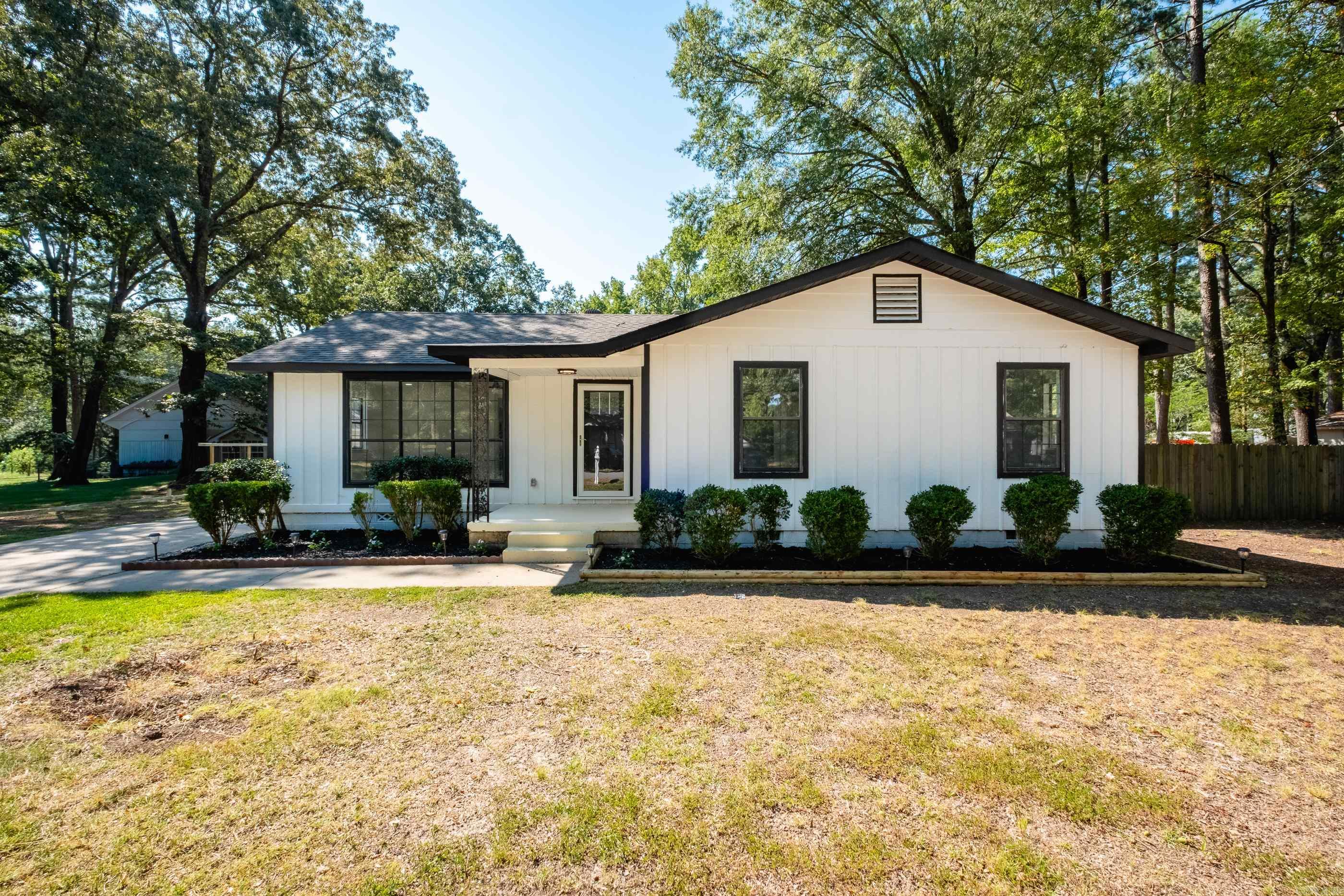 Beautifully remodeled one-story home featuring 4 bedrooms and 2.5 bathrooms. The open floor plan flows seamlessly with new wood-look flooring, large picture windows, and modern finishes throughout. The kitchen is a showstopper with quartz countertops, subway tile backsplash, and stainless steel appliances. Step outside to your private backyard oasis with an inground pool, plus a detached garage with a man cave/shop for hobbies or extra space. This home offers high-end updates, stylish design, and plenty of room to relax and entertain — move-in ready! Agents see remarks*