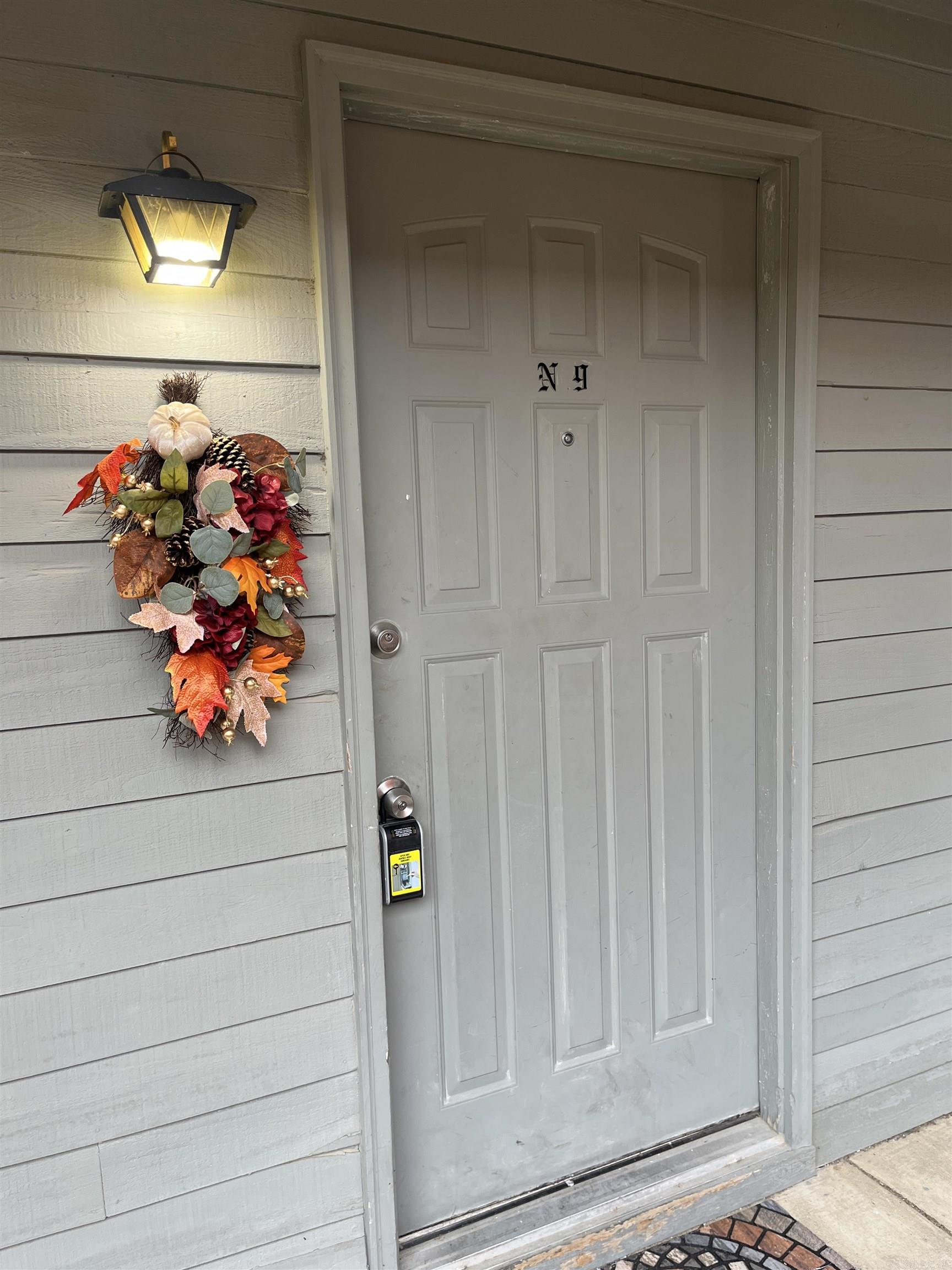 Updated 2BR/1.5BA Cambridge Court condo with complex in ground pool. Features include open living area with fireplace, wood-look flooring, and private balcony. Kitchen offers updated cabinets, backsplash, and pass-through to living room. Bedrooms are spacious with good closet space; primary bath includes large soaking tub. Neutral paint and modern finishes throughout. Convenient location near shopping and dining.
